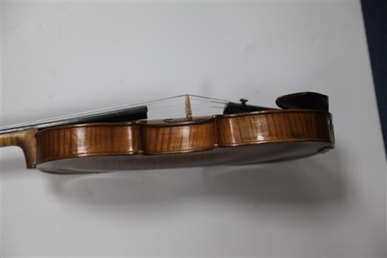 A violin stamped Thompsons London, length of back 35.2cm, cased